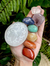 Cargar imagen en el visor de la galería, Selenite Engraved Meditation Palm Stone + Chakra Set 7 Crystals